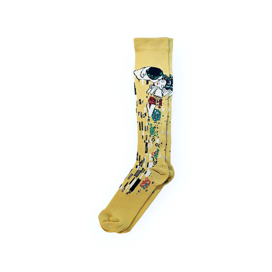 A pair of yellow compression socks with the famous painting 'Kiss' printed on it.