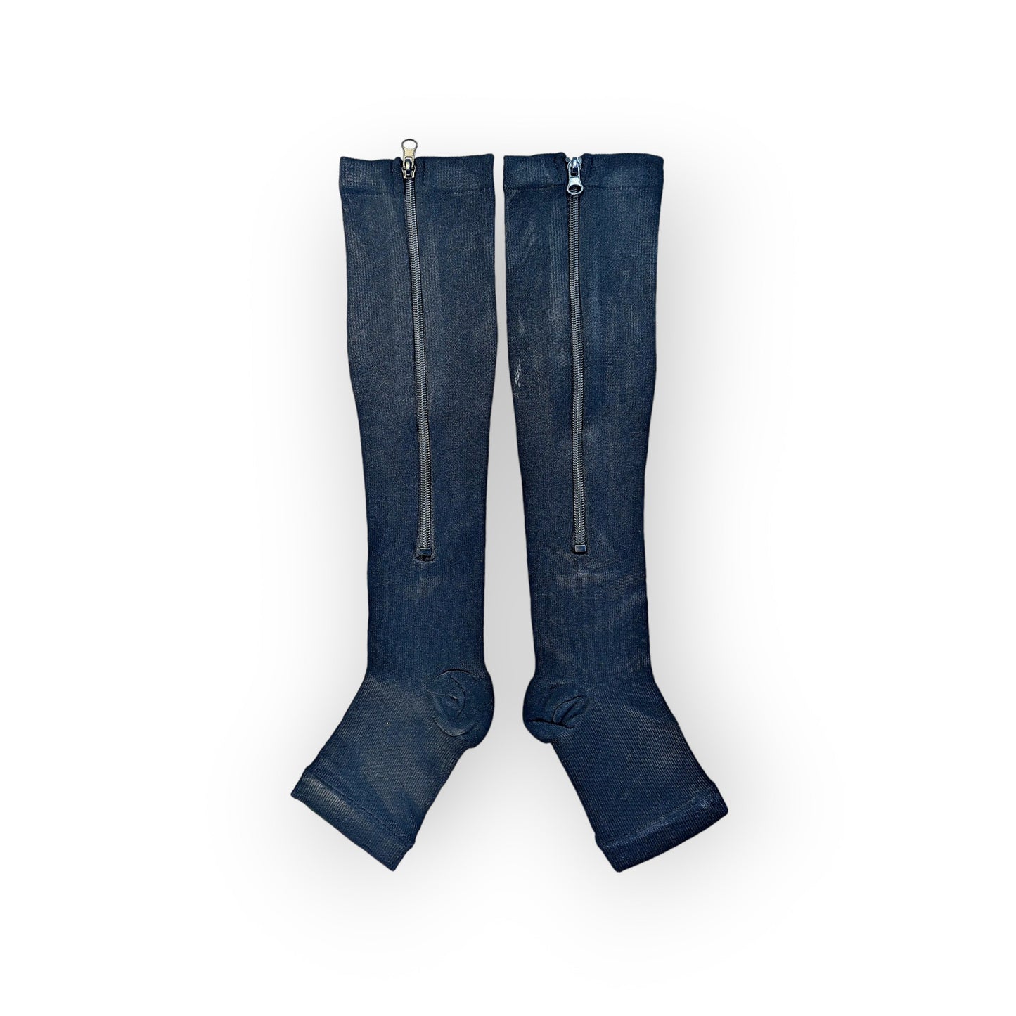 A pair of black colored zippered knee-high compression socks