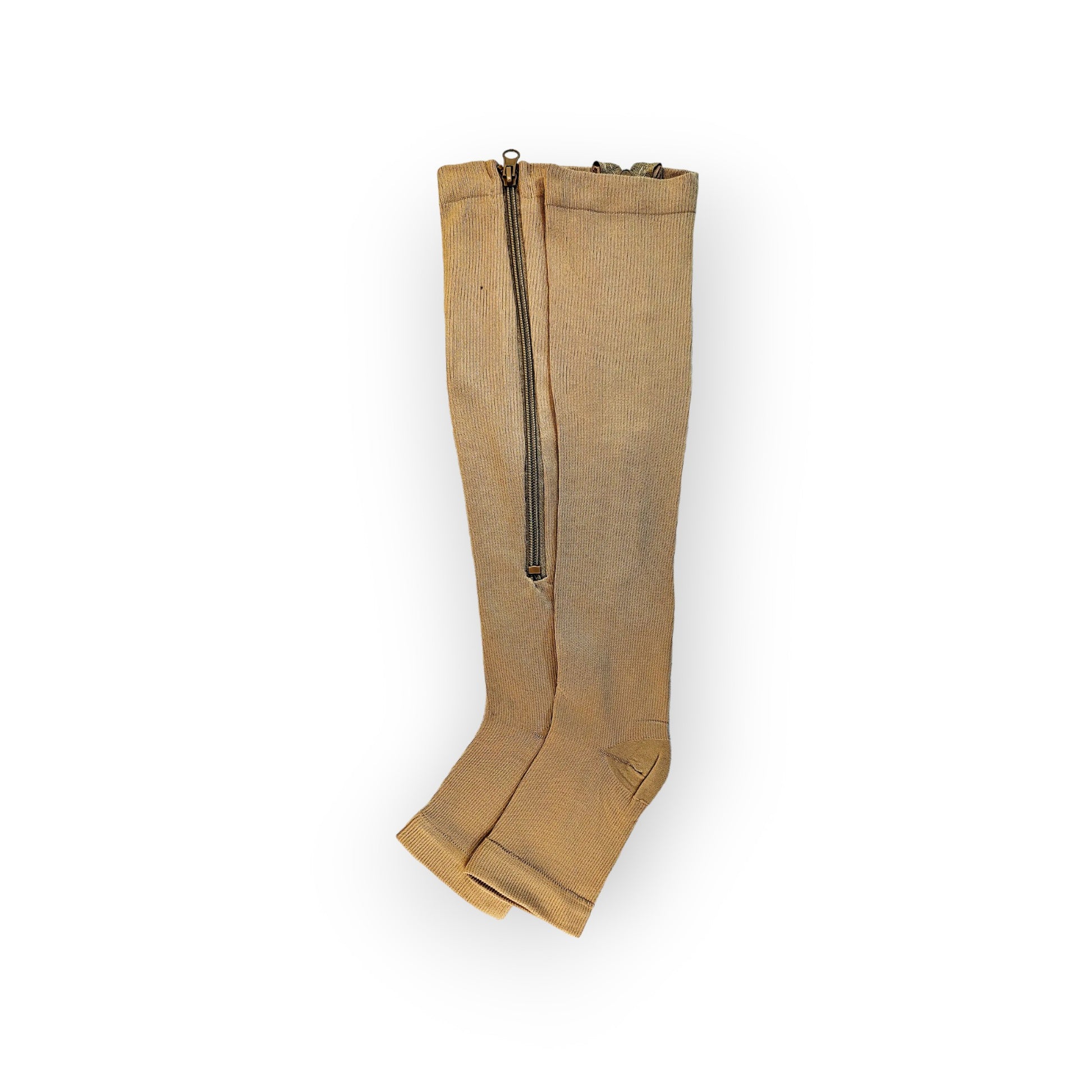 A pair of skin colored zippered knee-high compression socks